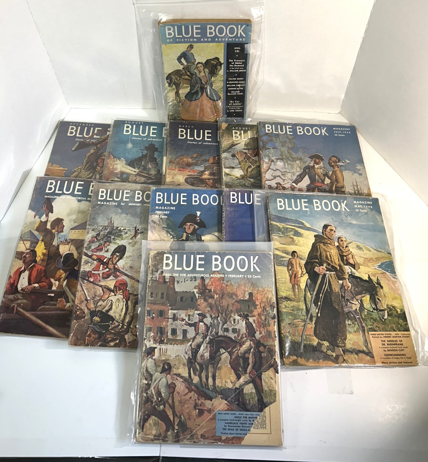 Lot of 12 Blue Book of Fiction and Adventure 1930s-1950s Pulp Magazines